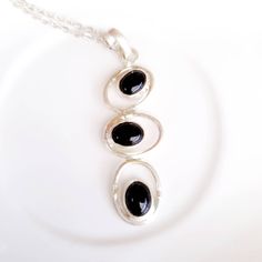 "Black onyx  pendant,silver onyx  bezel,onyx chain necklace,gift for her,gemstone pendant necklace,onyx  jewellery,simple Beautiful and simple black onyx  chain necklace. This unique pendant features 3 onyx gemstone  measuring 10mm and 16\" high quality silver chain." Elegant Metal Necklace As A Gift For Her, Dainty Metal Necklace For Her, Elegant Jewelry With Round Pendant And Natural Stones, Dainty Metal Necklace As Gift For Her, Elegant Metal Gemstone Necklaces, Elegant Metal Necklace With Gemstone, Elegant Metal Gemstone Necklace, Modern Gemstone Necklace For Gift, Metal Pendant Necklace As A Gift For Her