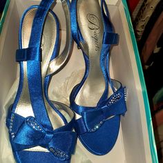 Brand-New, Never Worn 8.5 M Blue Open Toe Sandals For Prom, Blue Open Toe Heels For Prom, Blue Open Toe Wedding Shoes For Formal Occasions, Formal Blue Open Toe Wedding Shoes, Blue Synthetic Heels For Formal Occasions, Blue Synthetic Low Heels, Blue Wedding Shoes With 4-inch Heel For Evening, Formal Blue Synthetic Heels, Royal Blue Elegant Heels For Spring