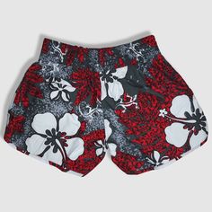 Speckled gray with red leaves and white hibiscus/plumeria/gecko pattern. Made of 100% microfiber polyester. Designed and shipped from Hawaii and made in Vietnam. Colors and fabric may vary from picture depending on cut. Red Floral Print Beach Shorts, Summer Floral Print Red Bottoms, Red Floral Print Summer Bottoms, Red Printed Summer Bottoms, Red Floral Print Beach Bottoms, Red Floral Print Bottoms For Beach Season, Red Printed Bottoms For Vacation, Gecko Pattern, White Hibiscus