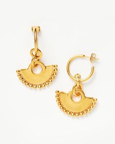 Zenyu Chandelier Hoop Earrings 18ct Gold Plated. The Zenyu Chandelier Hoops Echo Colombia's Rich Artistry and Heritage with a Modern Edge. Bobble-Trimmed Charms are Suspended from Dainty Hoops in a Brushed-Gold Finish. Looks Great Worn Solo or Teamed with Our Gold Chubby Huggies. Metal: 18Ct Gold Plated on Brass Dimensions: 48mm Total Length; Fan Charm 20 X 30 mm Weight: 16. 5 g Pair Gold Sterling Silver Clip-on Hoop Earrings, Gold Clip-on Hoop Earrings In Sterling Silver, Yellow Gold Semi-circle Earrings As Gift, Yellow Gold Semi-circle Earrings For Gift, Yellow Gold Dangle Hoop Earrings With Ear Wire, Yellow Gold Chandbali Hoop Earrings, Selling Earrings, Gold Huggies, Double Chain Bracelet