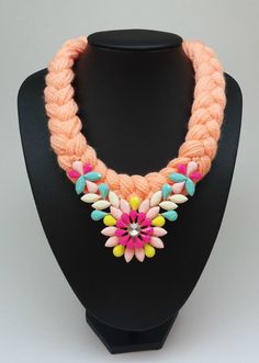 Coral Pink Colorful floral bib statement necklace. Embellish your outfit with this floral necklace for a feminine style. Floral necklaces are so feminine and fashionable that there is no doubt that your outfit will look just fabulous if you accessorize it with such a pretty necklace. Try to pair it up with casual tops or a simple dress for a daytime or night-out stylish girly look. This will look great with lots of different outfits! Work this piece with almost anything.  Was made by hand and I am sure that you'll adore it. All orders will ship out within 1-2 business days after your payment cleared. After your item has been packaged, it will be shipped and delivered via Elta Hellenic Post. Perfect gift for mothers, sisters, friends and especially for yourself.  You can enjoy lower shippin Pink Flower Pendant Necklace For Spring, Pink Choker Necklace For Spring, Handmade Pink Necklaces For Spring, Handmade Pink Flower Necklace For Party, Spring Party Pink Flower Necklace, Handmade Pink Bib Necklace For Gifts, Handmade Pink Bib Necklace As A Gift, Light Pink Necklace, Pretty Necklace