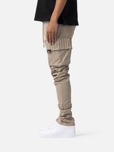 Cotton Cargo Pants With Cuffed Ankles, Urban Cotton Joggers With Cargo Pockets, Fitted Khaki Parachute Pants With Side Pockets, Khaki Utility Cargo Joggers, Cotton Pants With Cargo Pockets And Cuffed Ankles, Khaki Utility Joggers With Cargo Pockets, Fitted Cargo Pants With Side Pockets For Streetwear, Cotton Cargo Pants With Cuffed Ankles For Fall, Khaki Utility Joggers With Side Pockets