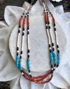 Native American Multi Stone Turquise Onyx Shell heshi Coral ART Glass Vintage Necklace Necklace is made of Heishi beads, Turquise , Onyx , Seeds and Coral Art Glass trade beads measures aprox 30 inches around Southwestern Multi-strand Polished Beaded Necklaces, Southwestern Multi-strand Turquoise Beads, Southwestern Polished Beads For Jewelry Making, Adjustable Traditional Turquoise Necklace With Large Beads, Traditional Heishi Beaded Necklaces, Multicolor Polished Southwestern Beads, Southwestern Style Beaded Necklaces With Gemstone Beads, Bohemian Heishi Beaded Necklace With Polished Beads, Bohemian Beaded Necklace With Polished Heishi Beads