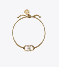 Embrace Ambition Pavé Bracelet: Women's Designer Bracelets | Tory Burch Pave Bracelet, Designer Bracelets, Crystal Bangle, The Embrace, Dope Jewelry, Jewelry Essentials, Jewelry Lookbook, Stacked Jewelry, Girly Jewelry