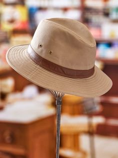 Inspired by Indian Jones (remember him?), this hat is built for adventure - whether that means heading out for a hike in the woods or venturing out to the wilds of a local restaurant. The handsome hat is sturdily crafted from water-repellant cotton twill in a classic style that looks good on just about everyone. Available in a variety of sizes for a custom fit. Tightly woven twill offers 50+UPF Garment-washed for a rugged, weathered look Finished with a 2-1/2" wide faux leather hatband Spot clea Classic Fedora With Curved Brim For Outdoor Activities, Classic Brimmed Fedora For Outdoor Activities, Classic Fedora With Curved Brim For Outdoor, Outdoor Fedora Hat, Country Style Hat With Curved Brim For Outdoor Activities, Country Style Curved Brim Hat For Outdoor Activities, Safari Hat With Short Brim For Outdoor, Country Fedora Hats For Outdoor Activities, Classic Fedora With Short Brim For Outdoor Activities