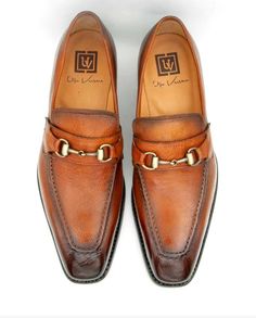 Style: Harry-Cognac Spectacular & Completely Handmade, this Hand Finished Lama Skin slip-on Loafer from the Ugo Vasare collection features Goodyear Welted construction, Metal Horsebit Hardware Detail, soft Calfskin lining, cushioned insole, a stitched welt and a full Leather sole! Matching Belt Available. Don't see your size? This style may be special ordered. Cordovan Shoes, Shoe Horn, Shoe Tree, Goodyear Welt, Horse Hair, Suede Shoes, Shoe Box, New Shoes, Cognac