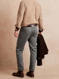 The same supreme comfort and ease of movement as our Traveler Jeans - now a jean-style chino made with high-recovery Italian stretch cotton.  Zip fly closure.  Traditional five-pocket styling.  Produced in a facility that runs P. A. C. E.  – Gap In Travel Pants, Slim Leg, Tan Color, Jeans Style, Stretch Cotton, Banana Republic, Khaki Pants, Mid Rise, Gap