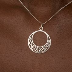 "Cast in Sterling Silver and hand finished to a high polish this pendant is a classic example of the intricate knotwork of the ancient Celtic people. The ancient Celts viewed life as an eternal journey, believing in continual reincarnation until spiritual fulfilment was achieved. The elaborate interlacing of one single line, with no beginning and no end, forms the knot work believed to represent the Celts fundamental belief in spiritual eternity. \"There was never, and never will be, a time when we did not or do not exist in some form\" Included is a 16, 18 or 20 inch silver curb chain - choose your length at checkout.  Pendant weight : 0.8 gr Comes gift boxed with explanation card. Ear Rings and set (at discount) available also.  Royal Mile Silver , Celtic pendant, sterling silver celtic Symbolic Large Oval Pendant Jewelry, Symbolic Jewelry With Large Oval Pendant, Ceremonial Symbolic Sterling Silver Jewelry, Symbolic Sterling Silver Jewelry For Ceremonial Occasions, Symbolic Round Necklace With Intricate Design, Traditional Medallion Jewelry With Polished Finish, Traditional Polished Medallion Jewelry, Spiritual Round Jewelry With Intricate Design, Spiritual Round Pendant Jewelry With Intricate Design