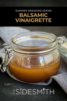 a jar filled with liquid sitting on top of a table