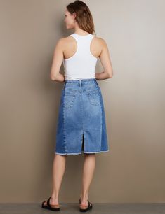 Nothing short of stunning— that's the Two Tone Short Jean Skirt, from Billy T, in our trademark premium denim, with two-tone construction, rear pockets, and fringed hem detail. The model is 5'9" wearing size 26 Fabric: 95% Cotton 4% Polyester 1% Spandex Length: 23" from waistband Fitted Medium Wash Skirt With Frayed Hem, Knee-length Denim Skirt With Frayed Hem In Medium Wash, Knee-length Medium Wash Denim Skirt With Frayed Hem, Knee-length Denim Skirt With Frayed Hem, Medium Wash, Dark Wash Knee-length Bottoms With Frayed Hem, Knee-length Medium Wash Bottoms With Frayed Hem, Medium Wash Relaxed Skirt With Frayed Hem, Medium Wash Knee-length Skirt With Frayed Hem, Mid-rise Relaxed Denim Skirt With Frayed Hem