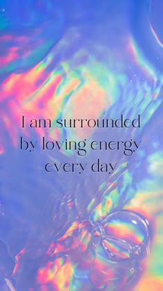 an image with the words i am surrounded by loving energy and every day written on it