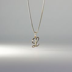 A timeless piece that will never go out of style. This 14K gold calligraphy pendant is the perfect and most stunning way of keeping a name close to your heart. We handmade each piece so you can assure you're getting a one-of-a-kind pendant that is not like any other. This 14K solid gold letter pendant is flawlessly crafted to look super chic and elegant around your neck. Pair it with a nice gold chain and wear it with almost all of your outfits. The piece is such a versatile lettering necklace. Yellow Gold Box Chain Necklace With Initial Pendant, Yellow Gold Necklace With Box Chain And Initial Pendant, 14k Gold Initial Pendant Jewelry With Box Chain, Gold Nameplate Jewelry With Box Chain, 14k Gold Initial Pendant Necklace With Box Chain, Elegant Nameplate Box Chain Jewelry, Yellow Gold Jewelry With Initial Pendant Box Chain, Elegant Initial Necklace With Box Chain As Gift, White Gold Pendant Name Necklace