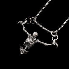 The skeleton necklace is a captivating and edgy piece of jewelry that exudes a sense of intrigue and macabre beauty. This necklace features a meticulously crafted skeletal figure and is perfect for those that love the gothic style. Includes 20” chain Halloween Punk Style Clavicle Chain Necklace, Punk Style Clavicle Chain Necklace For Halloween, Punk Style Clavicle Chain Necklaces For Halloween, Gothic Clavicle Chain Jewelry For Halloween, Halloween Stainless Steel Chain Necklace, Gothic Clavicle Chain Necklace For Halloween, Gothic Halloween Clavicle Chain Necklace, Gothic Sterling Silver Chain Jewelry, Halloween Gothic Necklaces With Adjustable Chain