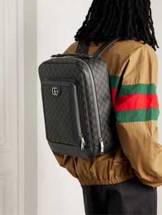 Part of the iconic 'Ophidia' line, Gucci's backpack is made from hard-wearing coated-canvas that's printed with the al-lover 'GG' monogram. It's reinforced with tonal leather trims and has a comfortable padded back panel. Gucci Backpack Bag, Gucci Classic Backpack, Classic Gucci Backpack, Gucci Rectangular Travel Backpack, Gucci Rectangular Backpack For Everyday Use, Gucci Travel Backpack, Rectangular, Luxury Gucci Rectangular Backpack, Gucci Monogram Canvas Bag With Zipper, Designer Gucci Leather Backpack