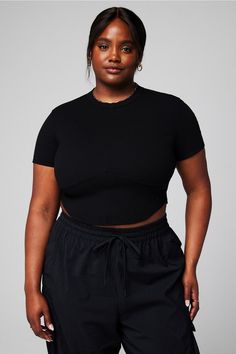 Seamed Rib Baby Tee Fabletics black female Activewear >> Womens >> Tops >> Short Sleeve T-Shirts >> Short-Sleeve Top plus Everyday Fitted Black T-shirt For Loungewear, Black Crew Neck Crop Top For Loungewear, Medium Support Crop Top For Loungewear, Casual Medium Support Tops For Loungewear, Black Short Sleeve Activewear For Loungewear, Black Crop Top For Loungewear, Black Cropped T-shirt In Athleisure Style, Black Short Sleeve Crop Top For Loungewear, Black Crop Top For Gym