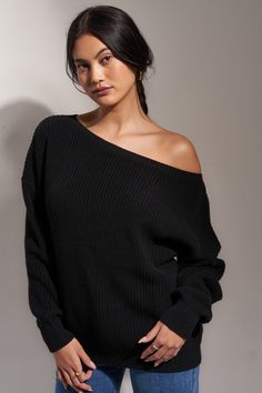 100% cotton, slightly oversized, snuggly but stylish; it's no wonder this shoulder-revealing sweater is a totally must have. Twist Back Sweater, Oversized Black Sweater Outfit, Black Off The Shoulder Sweater, Black Sweater Outfit, Oversized Black Sweater, Slouchy Sweater, Wardrobe Outfits, Off Shoulder Sweater, Favorite Sweater