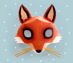 a red fox mask on a blue background