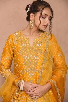 Shop for Surbhi shah Yellow Cotton Bandhej Kurta Lehenga Set for Women Online at Aza Fashions Yellow Embroidered Kundan Sets, Designer Yellow Kundan Sets, Transitional Yellow Traditional Wear With Dori Work, Yellow Kundan Kurta For Navratri, Yellow Kurta For Navratri, Fitted Gold Palazzo Set With Resham Embroidery, Transitional Yellow Sharara With Zari Work, Yellow Kundan Sets For Eid, Yellow Embroidered Chinon Palazzo Set