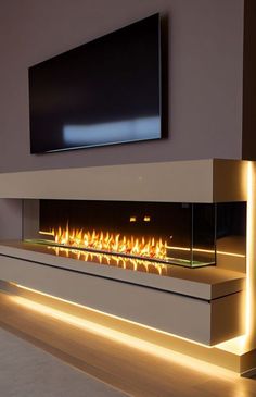 a modern fireplace with glowing flames in the middle