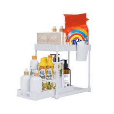 a white shelf with various items on it