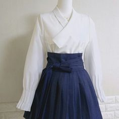 This is a Korean Modern Hanbok Blouse/Shirt(Jeogori) for Women. This blouse is made of two layers for the body part and one layer for the sleeve part, making it light and comfortable to wear. The unique shape of the collar and the sleeve design with pretty pin tucks add a special touch. This hanbok is modernly designed so you can wear it comfortably and beautifully. This modern hanbok is perfect dress for daily and celebrations such as parties or various events. ⭐This blouse can be made in custom sizes. Please contact me if you would like to make your size. 🟠 Decorate more stylishly with accessories that go well with Hanbok. 🟠 Go look hanbok accessories: https://www.etsy.com/shop/LunarJogak?ref=seller-platform-mcnav&section_id=33148097 ⭐ FREE Shipping from Korea. The color of the clothes Elegant Fitted White Hanbok, White Long Sleeve Hanbok For Spring, Elegant Fitted Long Sleeve Hanbok, Summer Cosplay, Hanbok Women, Hanbok Accessories, Casual Party Dress, Clothing Reference, Modern Hanbok