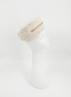 Classic pillbox hat in cream and gold boucle tweed. Finished with a gold and diamante chain. Satin lined. Handmade and one of a kind. Comes with a hat box. Luxury White Felt Hat With Flat Crown, Luxury Cream Cloche Hat With Wide Brim, Luxury Mini Hats With Feathers And Short Brim, Luxury Mini Hat With Feather Trim For Party, Luxury Mini Hat For Events With Pinched Crown, Luxury Pinched Crown Hat For Events, Luxury Headband Mini Hats For Royal Ascot, Luxury Cream Brimmed Fascinator, Luxury Fitted Cloche Hat For Wedding