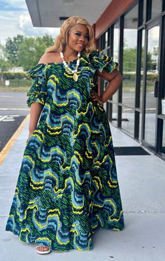 ✨ Step into elegance and comfort with our trending Ankara maternity gown.  ✨ The striking Ankara African Dress is expertly tailored to accentuate your beautiful curves while providing ample room for your growing belly. Its flowing silhouette drapes gracefully, offering both style and ease as you navigate through each trimester. Crafted from vibrant African print fabric, this long maxi dress is a celebration of culture and motherhood. Designed with the modern African woman in mind, this maternity gown exudes confidence and sophistication.  ✨ Whether attending a special occasion or simply embracing your everyday chic, this Ankara Maternity Gown is the epitome of effortless glamour. Embrace tradition with a contemporary twist and embrace your maternal glow with every step you take. The plungi Africa Long Dress Style, Summer Maternity Wear Floor-length Maxi Dress, Maternity Maxi Dress Floor-length, Floor-length Maternity Maxi Dress, Maternity Dresses With Ruffles, Summer Maternity Maxi Dress, Floor-length, Summer Maternity Floor-length Maxi Dress, Spring Maternity Floor-length Dresses, Flowy Floor-length Maxi Dress For Maternity