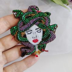 Medusa Gorgon brooch, halloween jewelry for women, handmade - Inspire Uplift Handmade Brooches For Halloween Gift, Unique Handmade Black Brooches, Halloween Brooch Jewelry Gift, Halloween Gift Jewelry Brooch, Unique Green Beaded Brooches, Handmade Black Brooches As Gift, Unique Black Brooches For Gifts, Unique Handmade Party Pins, Novelty Brooch Jewelry Gift