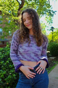 Purple handmade crochet sweater with a scalloped detail in the sleeve. Fitted Fall Sweater With Crochet Trim, Fitted Sweater With Crochet Trim For Fall, Spring Crochet Crew Neck Sweater, Fall Knit Sweater With Crochet Trim, Fall Long Sleeve Sweater With Crochet Trim, Spring Hand Knitted Long Sleeve Sweater, Hand Knitted Long Sleeve Spring Sweater, Hand Knitted Long Sleeve Sweater For Spring, Fall Crochet Trim Crew Neck Top