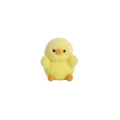 a small yellow stuffed animal sitting on top of a white surface