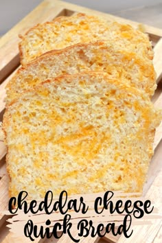 cheddar cheese quick bread on a cutting board with text overlay that reads cheddar cheese quick bread