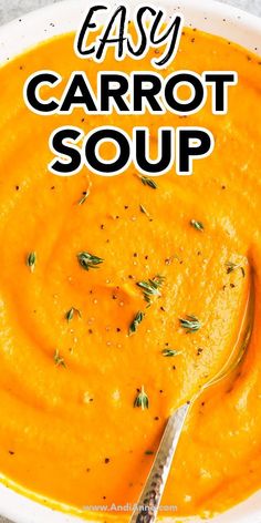 an easy carrot soup in a white bowl with a spoon on the side and text overlay that reads easy carrot soup