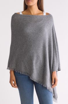 Fluttery fringe trims the edge of this chic poncho crafted from cozy cashmere. V-neck Elbow-length sleeves 100% cashmere Dry clean Imported Fringe Poncho, Poncho Shawl, Fringed Poncho, Swimwear Cover Ups, Fringe Trim, Elbow Length Sleeve, The Edge, Nordstrom Rack, Shawl