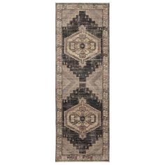 a long rug with an intricate design on the front and back side, in black and beige