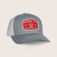 The Buckle Hat is a 6 panel mid-profile snapback trucker hat with a rodeo belt buckle shaped woven patch. Toss it on for an 8 second ride, or a night out at the rodeo. At Cowboy Cool, we hope to inspire the next generation of rodeo stars. Color: Heather Grey/White Adjustable Snapback Pre-Curved Bill with Cotton Sweatband Mid-Profile, 6-Panel Structured Crown Breathable Mesh Back Cotton-Poly/Nylon Mesh Woven Label Patch with a Merrowed-Edge Cowboy Cool Woven Label and Icon Tag Rodeo Belt, Rodeo Belt Buckles, Woven Label, Woven Labels, The Next Generation, Next Generation, Belt Buckle, Rodeo, Belt Buckles