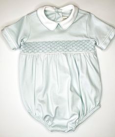 Add timeless elegance to your little one's wardrobe with our classic Collared Blue Smocked Bubble. Crafted with delicate smocking and a charming collar detail, this ensemble exudes sophistication for any special occasion. - 100% pima cotton - Available in sizes NB to 12m - Delicate details, blue smocked *Due to individual computer monitor settings, actual colors may vary slightly from those you see on the screen* Photography by Caroline Guinn Photography Smocked Baby Clothes, Screen Photography, Mignonne Gavigan, Park Designs, Scarf Hat, Elizabeth And James, Delicate Details, Womens Activewear, Sweater And Shorts