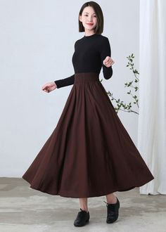 "★★ FEATURES * cotton linen skirt * with liner * Two side seam pockets * Wide elastic waistband * pleated waist detail * Plus size full skirt * A Line Skirt * Perfect for Spring Autumn * Wash by hand or machine with cold water ★★ The model is 170 cm (5′ 7″) tall with a 80 cm (31.5\") bust, 66 cm (26\") waist. She is wearing the brown linen skirt in size XS. ★★ Bespoke Order Service If you Request other color Request the length Your height is not between 155 cm- 172 cm Your weight is over 75 kg I Non-stretch Long Brown Skirt, Non-stretch Brown Long Skirt, Long Brown Cotton Skirt, Brown Cotton Long Skirt, Non-stretch Brown Cotton Skirt, Brown Long Cotton Skirt, Brown Cotton Maxi Skirt With Lined Skirt, Brown Cotton Flowy Skirt, Brown Cotton Maxi Skirt With Lining