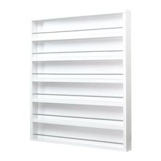 a white shelf with six shelves on each side and one section closed to show the bottom