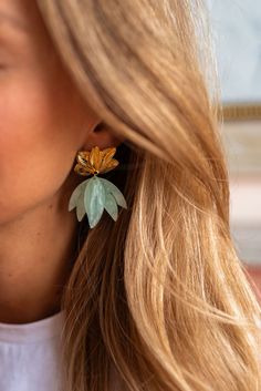 Sea green and golden earrings that feature floral pendants, which are curated from high quality stainless steel making these the perfect addition to elevate any outfit! Colors: sea green - coral Parisian Women, Golden Earrings, Floral Pendant, Sea Green, Summer Jewelry, Photo Inspo, Accessories Design, North America, Jewelry Accessories