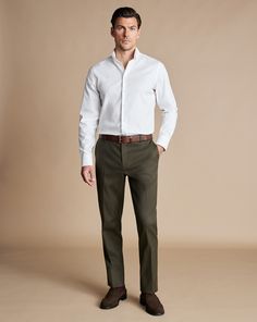 Smart Stretch Texture Trousers - Olive Green | Men's Charles Tyrwhitt Smart Stretch Texture Trousers - Olive Green Size W30 L30 Cotton Relaxed Mens Wedding Attire, Men’s Outfit For Wedding Guest, Green Formal Pants Outfit Men, Mens Wedding Rehearsal Outfit, Olive Dress Pants Outfit Men, Mens Welcome Party Outfit, Men Olive Green Pants Outfit, Business Casual Chinos Men, Mens Outfits Wedding Guest