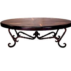 a wooden table with wrought iron legs and an oval top, on a white background