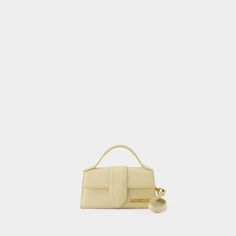 120 JACQUEMUS LE BAMBINO CROSSBODY Jacquemus Bag Mini, Jacquemus Bag, Structured Bag, Navy And Khaki, Neutral Beige, Dark Beige, Mini Crossbody Bag, Mini Crossbody, Metallic Logo