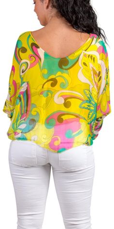 Dolman Sleeve Silk Crop Top with Groovy Abstract Print. Features a Stretch Interior Lining. 30% Silk, 70% Viscose Exterior | 95% Viscose, 5% Elastic Interior Made in Italy One size fits most Model 5'7" Vibrant V-neck Blouse For Beach, Vibrant Summer Beach Blouse, Vibrant Floral Print Beach Blouse, Vibrant Floral Print Blouse For Beach, Chic Green Top For The Beach, Yellow Beachwear Tops For Vacation, Chic Printed Blouse For Beach, Flowy Top For Beach Cover-up In Spring, Green Flowy Blouse For Vacation