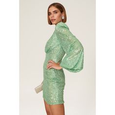 Light green sequins (100% Polyester). Sheath. V-neck. Long sleeves. Back zipper clousre. 32.5" from shoulder to hemline. Imported. Glamorous Green Mini Bodycon Dress, Green Sequin Bodycon Dress For Party Season, Green Bodycon Dress For Night Out Party Season, Glamorous Green Sequined Bodycon Dress, Green Sequin Bodycon Cocktail Dress, Glamorous Green Bodycon Dress For Party Season, Fitted Green Sequined Bodycon Dress, Glamorous Green Bodycon Dress For Night Out, Green Long Sleeve Sequin Dress