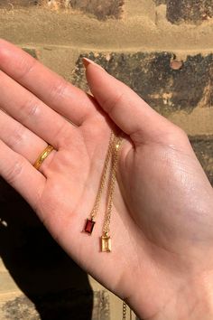 Simple, gold minimalist necklaces with beautiful baguette citrine & garnet stones. Great for layering. #citrinenecklace #garnetnecklace #goldnecklace #layeringnecklace