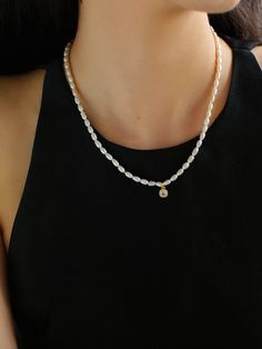 This exquisite piece features lustrous, iridescent natural freshwater pearls paired with a micro-pavé zircon pendant. The pendant comes in classic and sophisticated shapes—square, teardrop, and oval—adding a touch of refined luxury. Whether worn alone or layered, this necklace enhances any outfit with its graceful charm and subtle opulence. Metal: 18K Recycled Gold Plated Brass Gemstone: Freshwater Pearl Chain Length: 410-460mm Pendant Dimensions: 6-8mm Edison Pearls, Square Pendant, Tiger Eye Stone, Recycled Gold, Pearl Chain, Ring Bracelet, Stone Necklace, Chain Lengths, Chain Length