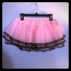 Nwot Pink Tulle And Lace Short Skirt. Elastic Waist. Perfect For Pinup Or Boudoir Dress Up Or Photo Shoot, Halloween, Or Cosplay! Pink Lace Trim Mini Skirt, Pink Tiered Tulle Mini Skirt, Pink Party Bottoms With Lace Trim, Fitted Pink Balletcore Skirt, Stretch Pink Ruffled Skirt, Stretch Pink Skirt With Ruffles, Pink Skirt With Lace Trim, Cute Stretch Pink Skirt, Fitted Pink Mini Skirt With Lace Trim