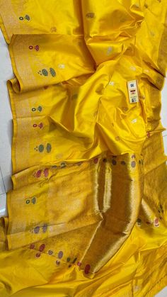 Pure katan Benarasi Saree Saree Designer Traditional Wear With Motifs, Designer Traditional Wear With Motifs For Festivals, Ceremonial Yellow Dupatta With Zari Weaving, Yellow Handloom Traditional Wear For Ceremonial Use, Ceremonial Yellow Handloom Saree, Yellow Ceremonial Dupatta With Traditional Patterns, Ceremonial Yellow Dupatta With Traditional Patterns, Yellow Raw Silk Dupatta With Weaving Work, Designer Silk Traditional Wear With Cutdana