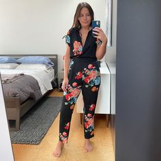 This Jumpsuit Fits Like A Dream!! That Is A Huge Deal Coming From A Woman Who Is 5’2” It’s So Hard For Me To Find Jumpsuits With A Fitted Crotch. Usually The Crotch Is A Drop Crotch And It’s Not A Good Look.. Not Only Is It Very Flattering And Fitted In All The Right Places, It’s Only Been Worn Once And Looks Brand New. I Added 2 Photos Of The Closure On The Left Side Of The Jumpsuit. It’s Next To The Left Pocket That There Are 2 Buttons And An Invisible Zipper. Full Disclosure One Of The Button Black Floral Print Jumpsuits And Rompers For Workwear, Zara V-neck Jumpsuits And Rompers For Loungewear, Zara Jumpsuits And Rompers For Spring Loungewear, Zara Fitted Short Sleeve Jumpsuit, Zara Casual Floral Print Jumpsuits And Rompers, Zara Black Jumpsuits And Rompers For Summer, Casual Zara Jumpsuits And Rompers For Night Out, Black V-neck Jumpsuit From Zara, Zara Black V-neck Jumpsuit