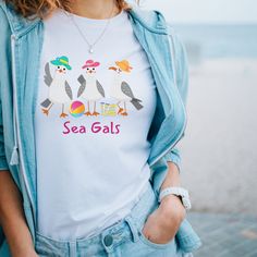 Beach shirt, sea gulls, Sea Gals shirt, happy shirts, Salt Life tee, Women's gifts This classic unisex jersey short sleeve tee fits like a well-loved favorite. Soft cotton and quality print make users fall in love with it over and over again. These t-shirts have-ribbed knit collars to bolster shaping. The shoulders have taping for better fit over time. Dual side seams hold the garment's shape for longer.  .: 100% Airlume combed and ringspun cotton (fiber content may vary for different colors) .: White T-shirt For Summer Gift, White Summer T-shirt For Gifts, White Summer T-shirt For Gift, White Summer T-shirt Gift, Funny Print T-shirt For Summer Gifts, Funny Beach T-shirt With Crew Neck, White Casual T-shirt As Gift, White Casual T-shirt As A Gift, Casual White T-shirt As A Gift